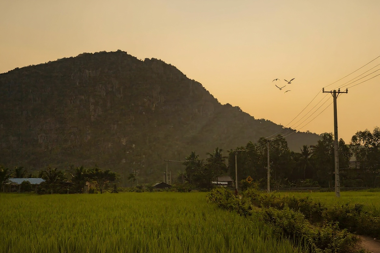 Kampot town on the Preaek Tuek Chhu river — colonial French architecture, riverside bars, and very little urgency