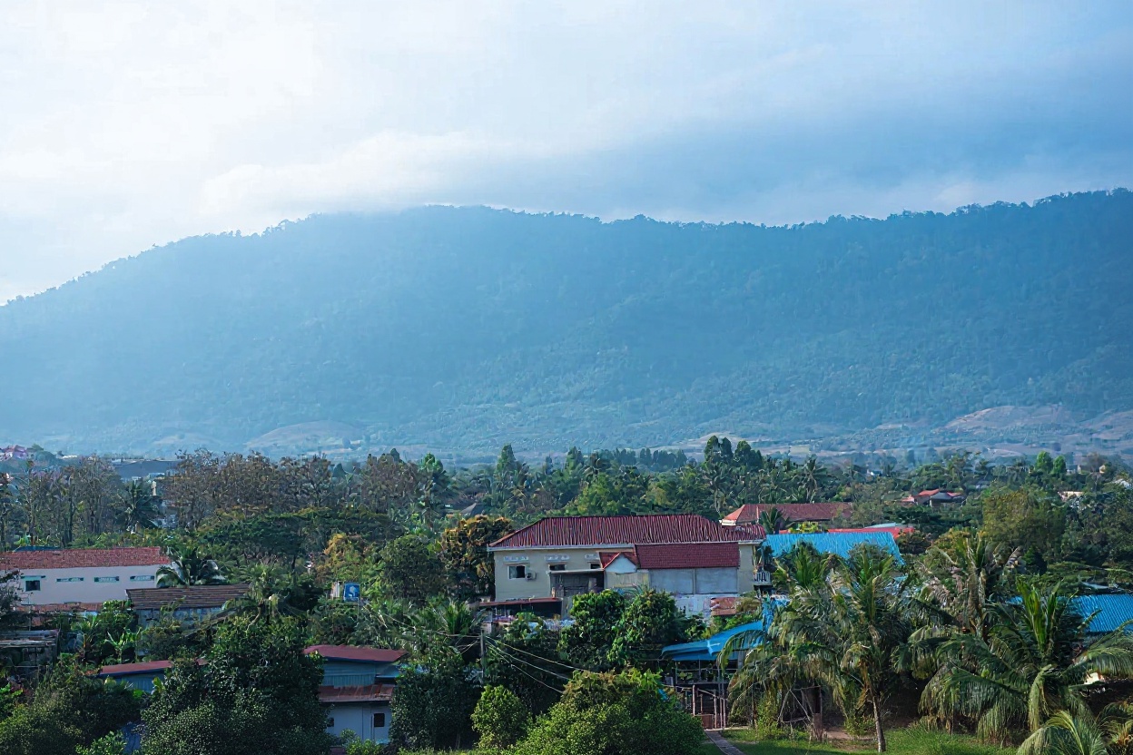 The Bokor Palace Hotel — French colonial hill station built 1921, abandoned 1972, restored partially and surrounded by cloud